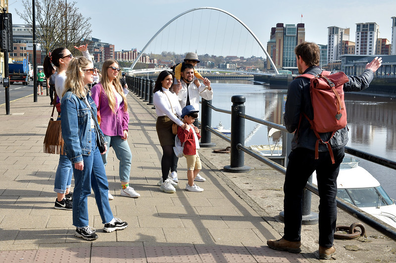 Visitors enjoy a Guided Tour on the Quayside